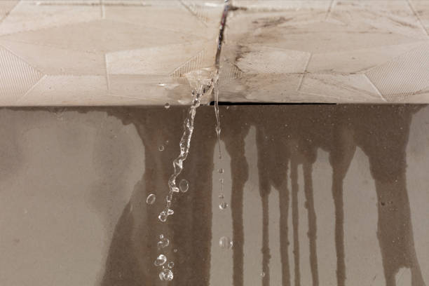 Professional Flood Damage Cleanup technician working in Adelanto, CA